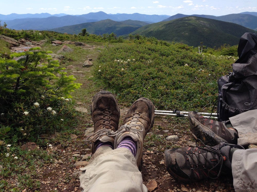 Enjoying our lunch break, nestled into a rock on the ridge walk between peaks